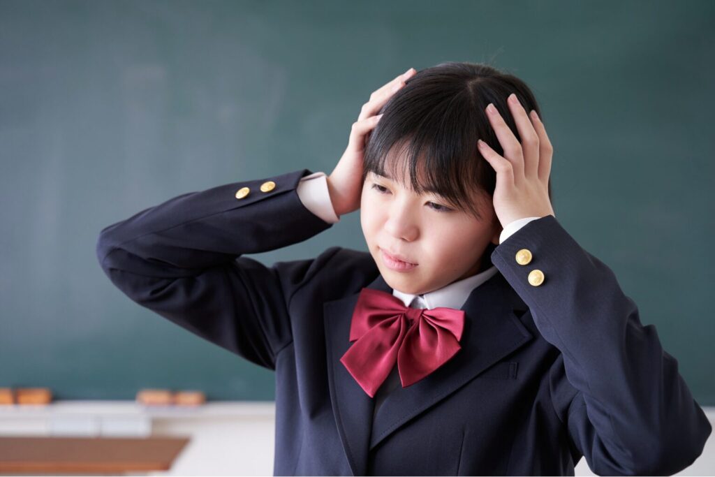 困っている女子生徒